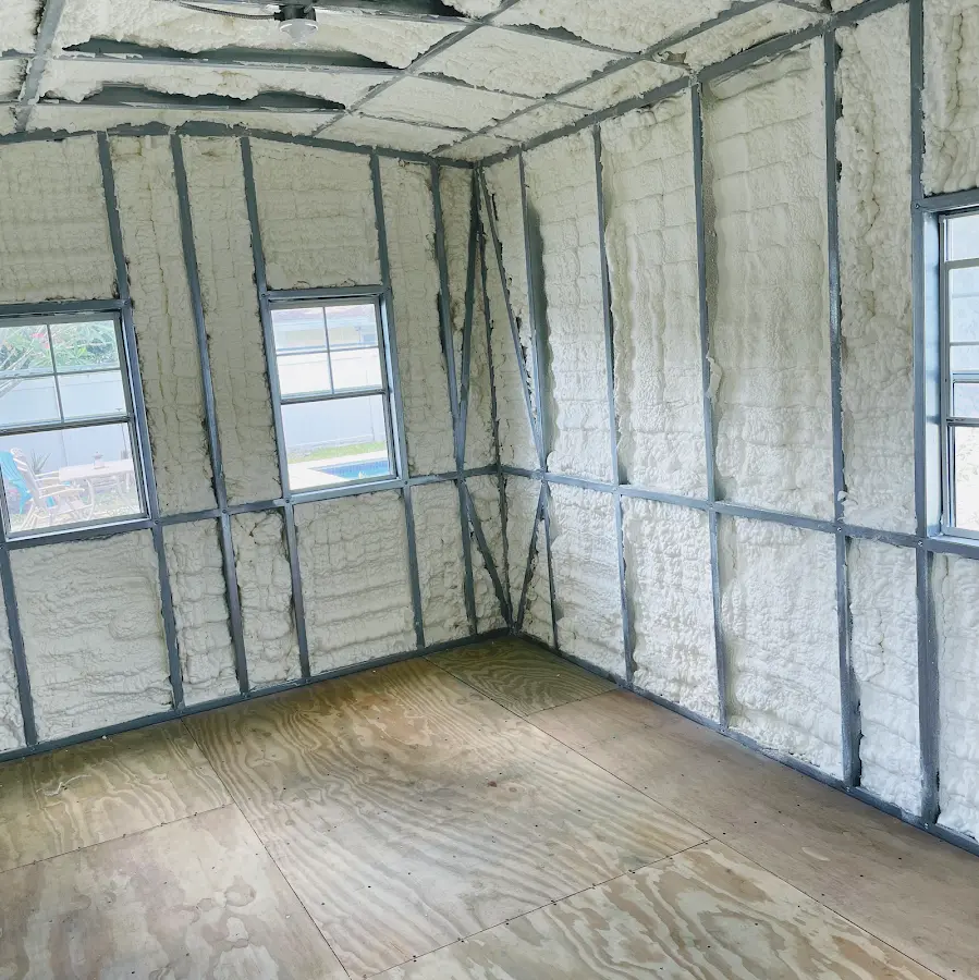 Closed-cell spray foam insulation applied to wall cavities in a residential project in Camden